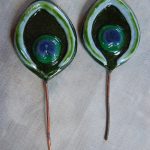 pauwenogen van gesmolten grit ( glaspoeder)